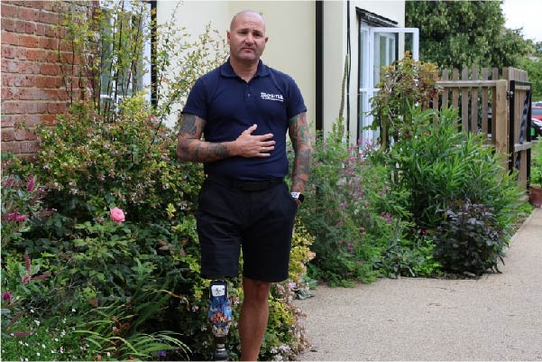 Colin Limbless Veteran standing by St Helena Hospice.