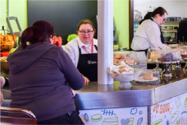 Step Up for Work employee working in the Lily and Lime cafe